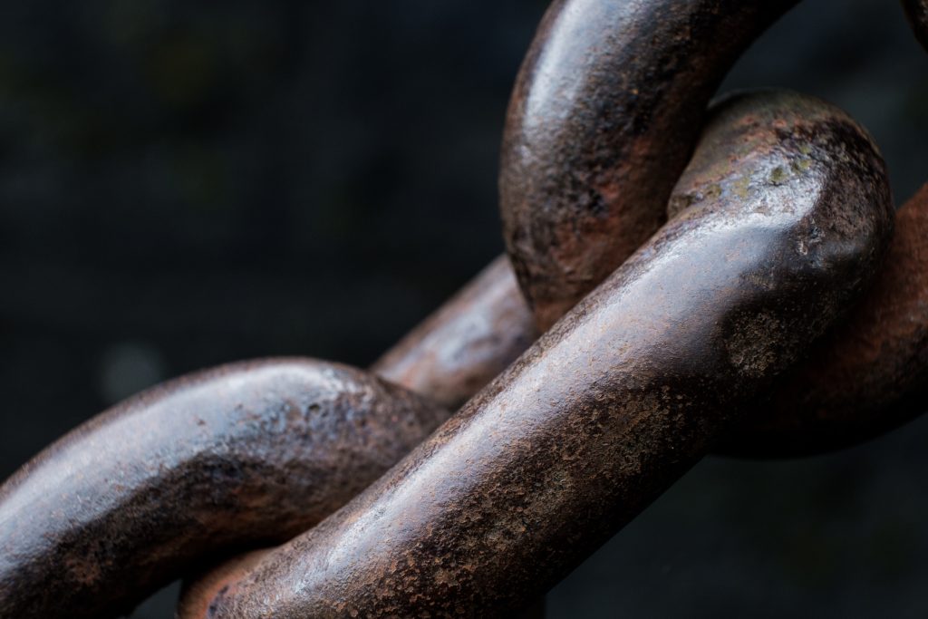Macro image of old chain links. freedom.